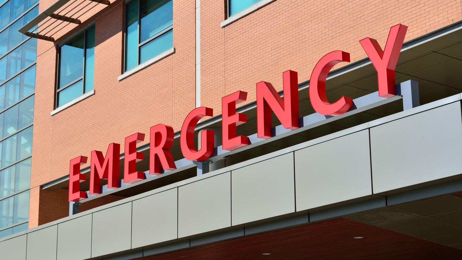 Hospital emergency department entrance sign, where the triage process begins the moment a patient arrives