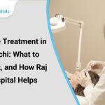 Doctor treating a patient in a clinical setting with Raj Hospitals branding.